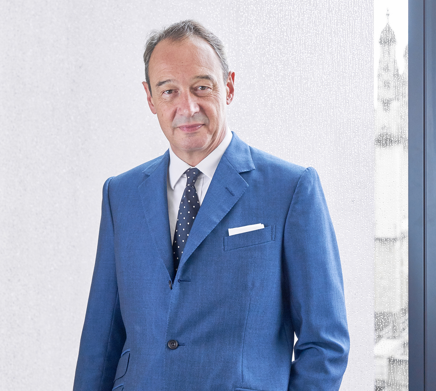 John Cahill, Managing Partner, Stewarts }}