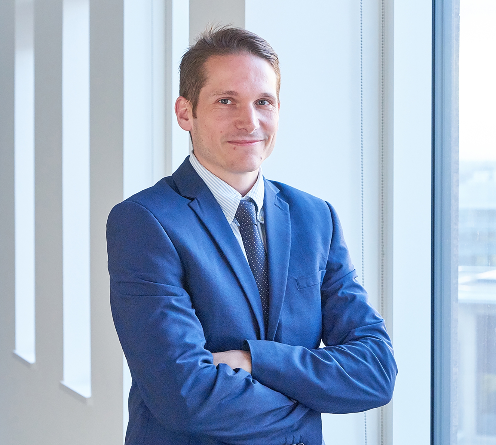 Mark Lewis, Economist Director, Competition Litigation }}