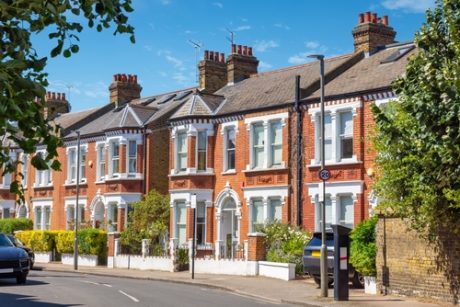 Row of houses on street in UK suburb